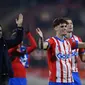 Pemain belakang Girona Miguel Gutierrez merayakan kemenangan timnya atas  Deportivo Alaves di Stadion Montilivi, Girona, 18 Desember 2023. Girona menang 3-0.(Pau BARRENA / AFP)