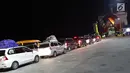 Kendaraan pemudik mengantre waktu masuk kapal penyeberangan di Dermaga 7 Pelabuhan Penyebrangan Merak, Banten, Sabtu (1/6/2019). Diperkirakan puncak arus mudik menuju pulau Sumatera akan terjadi pada Sabtu (1/6) dan Minggu (2/6). (Liputan6.com/Helmi Fithriansyah)