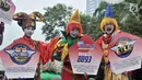 Badut menyosialisasikan sistem tilang Electronic Traffic Law Enforcement (ETLE) kepada pengunjung car free day (CFD) di Bundaran HI, Jakarta, Minggu (25/11). Sosialisasi ini untuk memperkenalkan sistem ETLE kepada masyarakat. (Merdeka.com/Iqbal Nugroho)