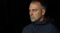 Pelatih Barcelona asal Jerman, Hans-Dieter Flick, difoto sebelum pertandingan leg pertama perempat final Liga Champions UEFA antara FC Barcelona dan BVB Borussia Dortmund di Estadi Olimpic Lluis Companys di Barcelona, Rabu dini hari WIB (10-4-2025). (LLUIS GENE/AFP)