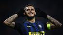  Inter Milan berpesta tiga gol tanpa balas atas Crotone dalam laga pekan ke-12 Serie A 2016-2017, di Stadion Giuseppe Meazza, Minggu (6/11/2016). Mauro Icardi mencetak 2 gol. (AFP/Marco Bertorello)
