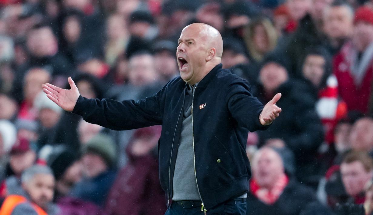 Setelah babak pertama berakhir tanpa gol, PSG menghukum tuan rumah melalui dua gol Dembele pada menit ke-72 dan 90+1. Liverpool yang mendominasi penguasaan bola gagal mengonversi peluang menjadi gol. (AP Photo/Jon Super)