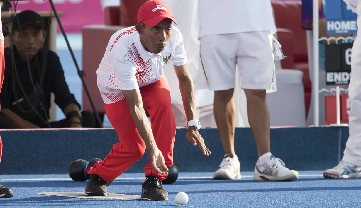 Kacung atlet Lawnball Indonesia bertanding di nomor B2 Open Single's pada Asian Para Games 2018 di Stadion Hockey, Gelora Bung Karno Jakarta, Senin (8/10/2018).  (Bola.com/Peksi Cahyo)