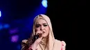 Penyanyi asal Malaysia ini menjadi salah satu bintang tamu spektakuler di Konser Raya 21 Indosiar. Penampilan mencuri perhatian publik lewat aksi panggungnya bersama lagu-lagu hitsnya. (Andy Masela/Bintang.com)