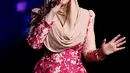 Penyanyi asal Malaysia ini menjadi salah satu bintang tamu spektakuler di Konser Raya 21 Indosiar. Penampilan mencuri perhatian publik lewat aksi panggungnya bersama lagu-lagu hitsnya. (Andy Masela/Bintang.com)