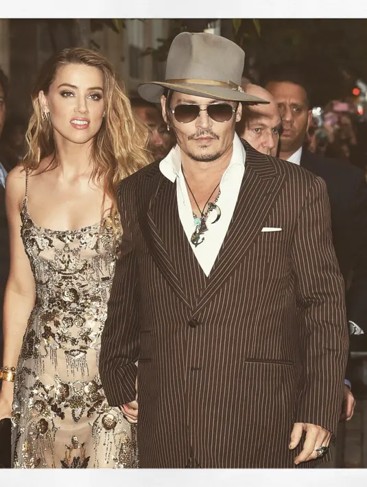 Amber Heard adalah model di sampul depan Marie Claire edisi Desember. Dia pun membicarakan tentang menikah dengan Johnny Depp dan membantah isu perpisahan mereka. (AFP/Bintang.com)