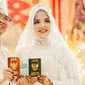 Putri Wahyuni Effendi dan suami yang menjadi salah satu korban Pesawat Sriwijaya Air SJ 182 jatuh akhir pekan lalu. (Liputan6.com/Istimewa)