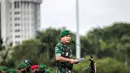 Kepala Staf Angkatan Darat (KSAD) Jenderal Dudung Abdurachman memimpin Apel Gelar Pasukan Jajaran TNI AD di Lapangan Monas, Jakarta, Selasa (25/1/2022). Pasukan TNI AD dan Alutsista dipamerkan saat mengikuti gelar apel pasukan. (Liputan6.com/Faizal Fanani)