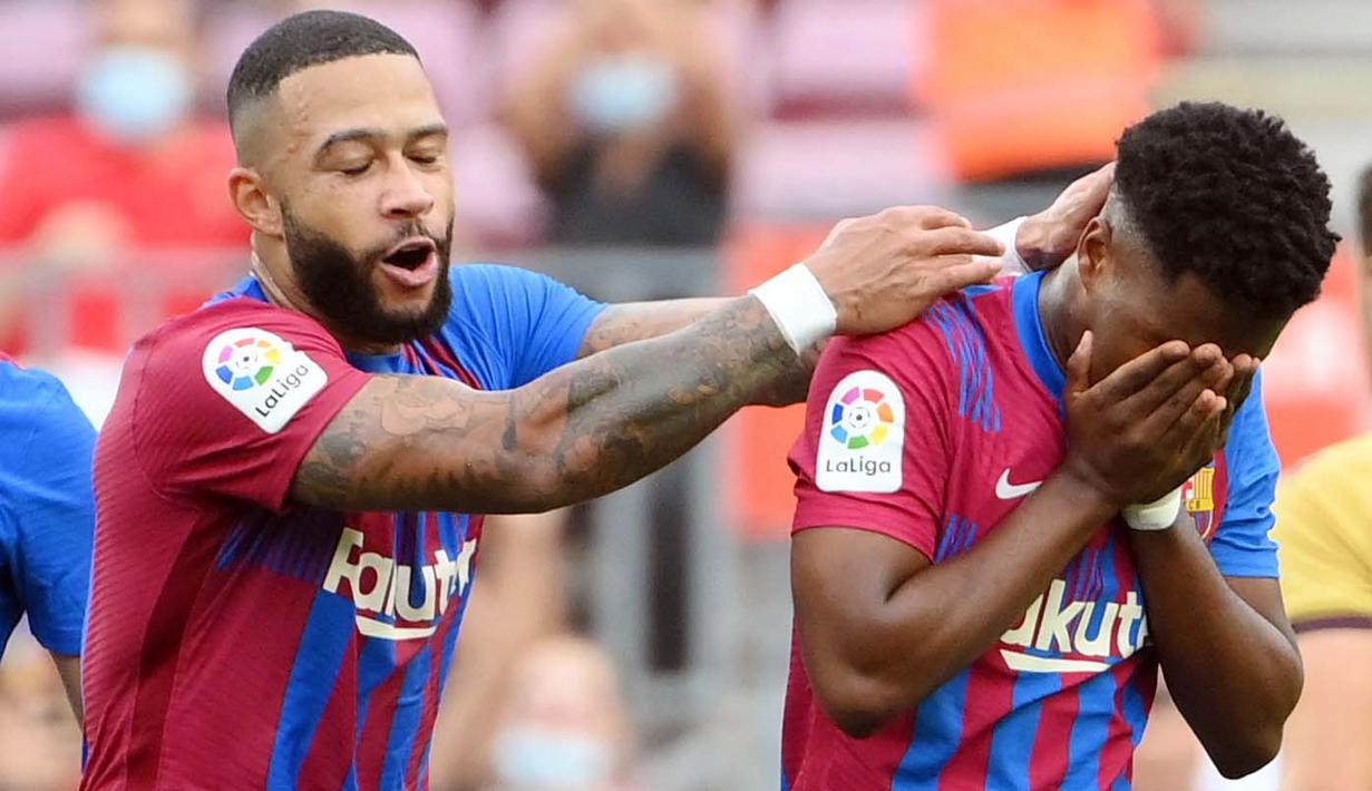 Menggantikan striker Luuk de Jong pada sepuluh menit sebelum waktu normal berakhir, Ansu Fati berhasil mencetak gol pada waktu tambahan. (AFP/Lluis Gene)