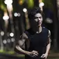 Seorang pria berlari di Taman Wanlu di Haikou, Provinsi Hainan, China selatan, pada 21 Mei 2020. Berlari di malam hari menjadi olahraga yang populer di kalangan warga Haikou. (Xinhua/Pu Xiaoxu)