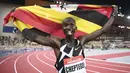 Pelari Uganda Joshua Cheptegei menjulurkan lidahnya usai memecahkan rekor dunia 5.000 meter putra di final kejuaraan Monaco Diamond League 2020, Stadion Louis II, Monako, Jumat (14/8/2020). Joshua memecahkan rekor dunia lari 5.000 meter dengan catatan waktu 12:35,36. (Matthias Hangst/Pool Via AP)