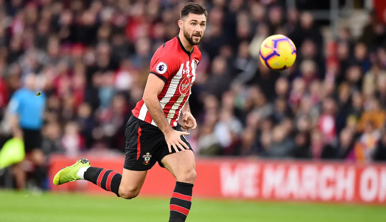 Charlie Austin - Mantan penggawa Southampton ini pernah menggeluti profesi yang cukup keras sebelum menjadi pesepak profesional. Pemain yang sempat dipanggil Timnas Inggris itu pernah bekerja sebagai tukang batu. (AFP/Glyn Kirk)