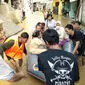 Banjir di Kelurahan Cililitan, Jakarta Timur, Jumat (26/4/2019). (Liputan6.com/Ady Anugrahadi)