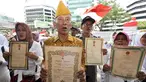 Puluhan orang yang terdiri dari keluarga veteran melakukan unjuk rasa di depan Gedung KPK, Jakarta, Kamis (18/12/2014). (Liputan6.com/Miftahul Hayat)