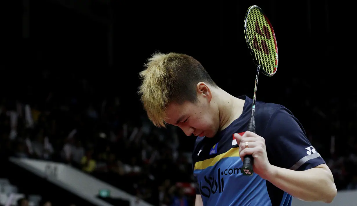 Ganda putra Indonesia, Marcus Gideon, menunduk saat melawan ganda Jerman pada Indonesia Masters 2019 di Istora Senayan, Jakarta, Rabu (23/1). Kevin / Marcus lolos ke 16 besar. (Bola.com/M. Iqbal Ichsan)