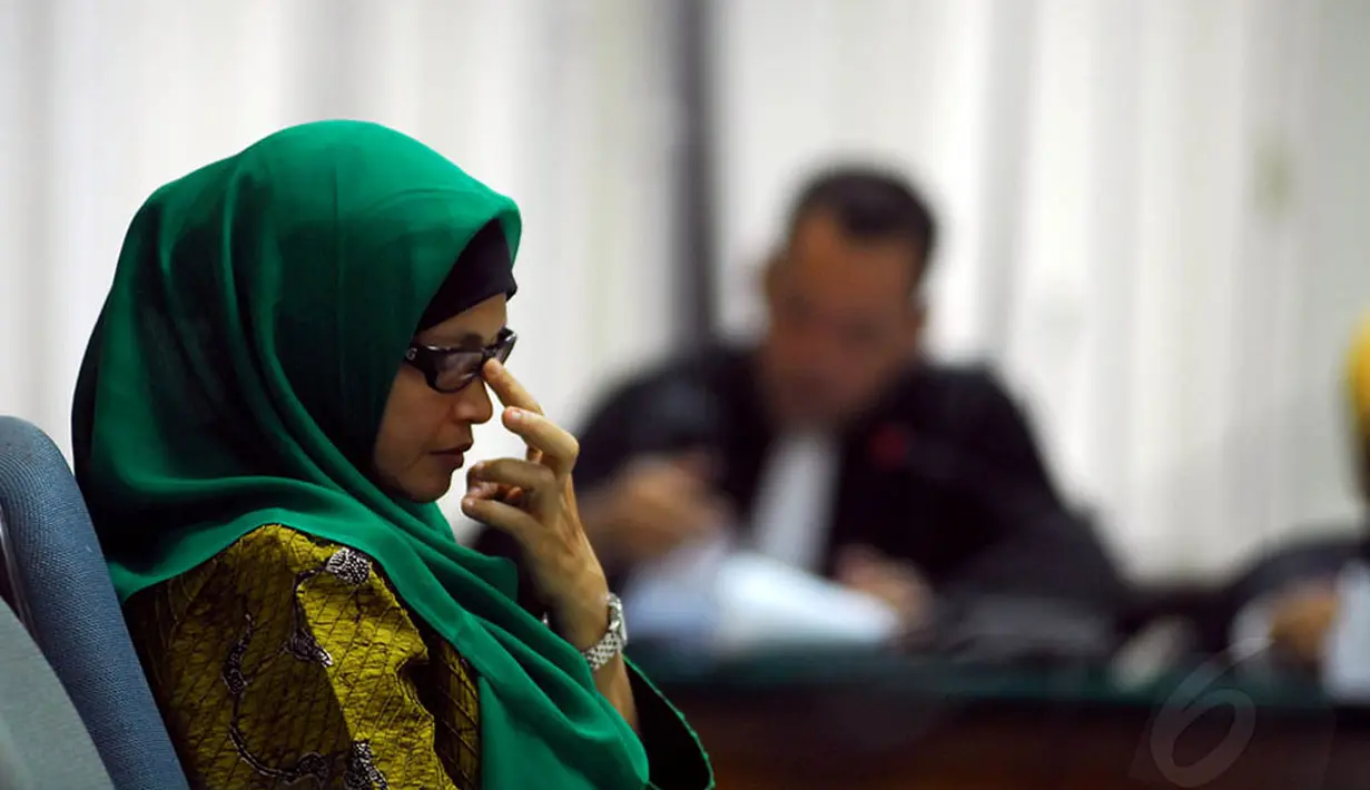 Jaksa Penuntut Umum Komisi Pemberantasan Korupsi,  menuntut pengacara Susi Tur Andayani pidana penjara selama 7 tahun dan denda Rp 250 juta.  Senin (19/5/14) (Liputan6.com/Miftahul Hayat)