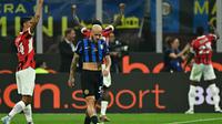 Derby della Madonnina antara Inter Milan versus AC Milan pada ajang Liga Italia 2024/2025. (Gabriel BOUYS / AFP)