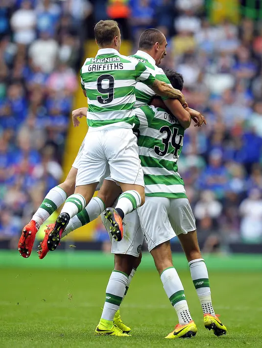 4. Celtic FC - Mantan pelatih Liverpool, Brendan Rodgers datang ke skuad armada Celtic FC dengan keyakinan yang penuh. Harapan tersebut pun muncul saat pasukan Hijau-Putih begitu mendominasi liga Skotlandia. (AFP/Andy Buchanan)
