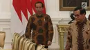 Presiden Joko Widodo memasuki ruangan untuk menerima kunjungan delegasi US Asean Business Council di Istana Merdeka, Selasa (13/3). Salah satu reformasi itu untuk meningkatkan ranking Kemudahan Berusaha. (Liputan6.con/Angga Yuniar)