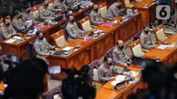 Kepala Kepolisian Negara Republik Indonesia (Kapolri) Jenderal Pol. Listyo Sigit Prabowo (depan kiri) saat mengikuti rapat dengar pendapat (RDP) dengan DPR RI di Jakarta, Rabu (24/8/2022). Rapat tersebut membahas kasus penembakan Brigadir J di rumah dinas Irjen Pol. Ferdy Sambo. (Liputan6.com/Angga Yuniar)