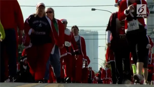 Di Las Vegas, AS digelar Santa Run. Sebuah lomba lari yang digelar untuk menyambut hari Natal.