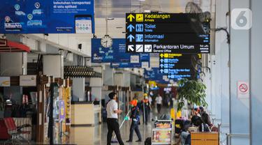 FOTO: Dampak Corona, Jumlah Penumpang di Bandara Halim dan Soetta Turun 30 Persen