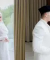 Pedangdut Rizki DA resmi melepas status dudanya dengan menikahi Hersa Rahayu Julianti. [@da2_rizki123/@nadh.photography]