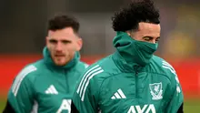 Gelandang Liverpool asal Inggris bernomor punggung 17, Curtis Jones, menghadiri sesi latihan tim di tempat latihan mereka di Kirkby, Liverpool, barat laut Inggris pada 20 Januari 2026, menjelang pertandingan League Phase Liga Champions UEFA melawan Olympique Marseille di Marseille.
(Oli SCARFF / AFP)