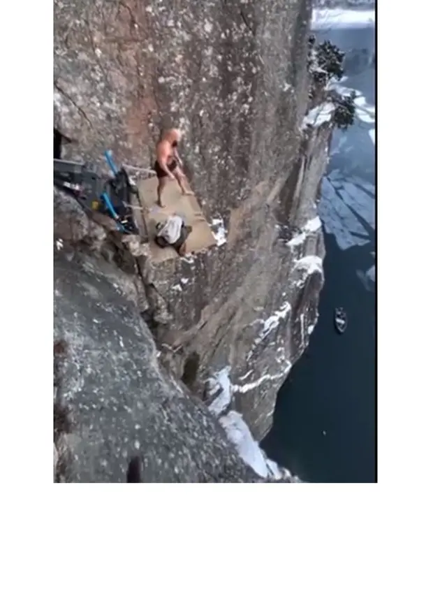 Duh, Aksi Pria Terjun dari Tebing Setinggi 40,5 Meter ke Danau Es Ini Nekat Banget