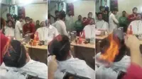 Aksi Shafaq Rajput ketika memotong rambut seorang pelanggan