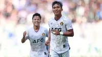 Pemain Persik Kediri, Muhammad Khanafi melakukan selebrasi setelah mencetak gol ke gawang Persib Bandung pada laga BRI Liga 1 2022/2023 di Stadion Pakansari, Bogor, Rabu (8/3/2023). (Bola.com/M Iqbal Ichsan)