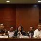 Menko Bidang Kemaritiman Luhut Binsar Pandjaitan bersama Menkeu Sri Mulyani, Menkominfo Rudiantara, Gubernur BI Agus Martowardojo memberi keterangan terkait Annual Meetings IMF-Word Bank Grup (IMF-WBG) di Jakarta, Selasa (13/3). (Liputan6.com/JohanTallo)