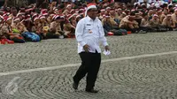 Plt Gubernur DKI Jakarta, Soni Sumarsono menghadiri kegiatan Silaturahmi Nusantara Bersatu, di Monas, Jakarta, Rabu (30/11). (Liputan6.com/Johan Tallo)