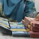 Rupiah Ditutup Melemah Lagi, Sentimen Fitch Jadi Penekan