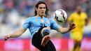 Edinson Cavani dengan berbesar hati akan mengganti nomor punggungnya dengan nomor 21, nomor yang dikenakan di timnas Uruguay, yang kebetulan baru saja ditinggalkan oleh Daniel James yang hijrah ke Leeds United. (Foto: AFP/Ronald Schemidt)