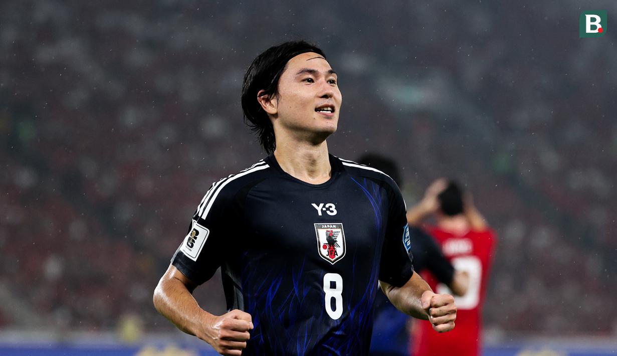 <p>Pemain Timnas Jepang,&nbsp;Takumi Minamino, merayakan gol ke gawang Timnas Indonesia pada Kualifikasi Piala Dunia 2026 Zona Asia di Stadion Gelora Bung Karno, Senayan, Jakarta, Jumat (15/11/2024) malam WIB. (Bola.com/Abdul Aziz)</p>