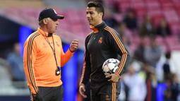 Carlo Ancelotti adalah salah satu dari segelintir ahli taktik yang telah memenangkan gelar liga di empat negara berbeda. Di bawah pelatih Italia tersebut, Cristiano Ronaldo mampu berada di puncak kejayaannya dengan mencetak 112 gol hanya dalam 101 laga di semua kompetisi. (AFP/Javier Soriano)