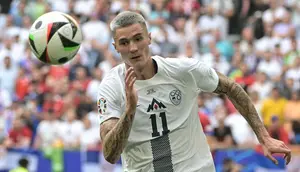 Striker Timnas Slovenia, Benjamin Sesko. (DAMIEN MEYER / AFP)