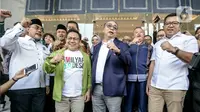 Muhaimin Iskandar tiba di Gedung DPP Partai NasDem sekitar pukul 14.30 WIB, dan disambut oleh Wakil Ketua Umum Partai NasDem Ahmad Ali dan Sekretaris Jenderal PKB Hasanuddin Wahid. (Liputan6.com/Faizal Fanani)