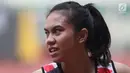 Atlet asal DKI Jakarta, Jeany Nurainy usai menyelesaikan lomba lari 100 meter putri U-20 Kejurnas Atletik U18, U20 dan Senior 2019 di Stadion Pakansari, Kab Bogor, Jumat (2/8/2019). Jeany Nurainy meraih posisi pertama dengan catatan waktu 12,15 detik. (Liputan6.com/Helmi Fithriansyah)