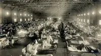 Rumah sakit darurat selama pandemi flu Spanyol, Camp Funston, Kansas, 1918.(foto: Arsip Sejarah Otis, Museum Nasional Kesehatan dan Kedokteran)