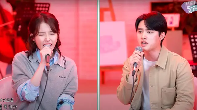 IU dan D.O. duet menyanyikan lagu Love Wins All.