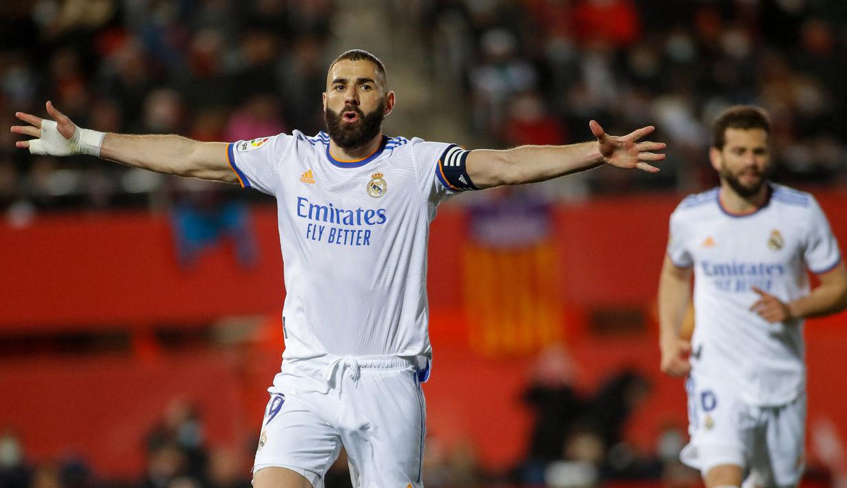 Diusianya yang sudah tidak muda, tapi perolehan gol Benzema justru kian banyak. Musim ini, ia sudah membukukan 32 gol dari 34 penampilan di semua kompetisi. (AFP/Jaime Reina)