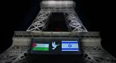 Gambar bendera Palestina (kiri) dan Israel serta seekor merpati dengan ranting zaitun, yang ditampilkan di Menara Eiffel pada malam sebelum Prancis berencana mengakui Negara Palestina, di Paris, pada 21 September 2025. (Bertrand GUAY/AFP)
