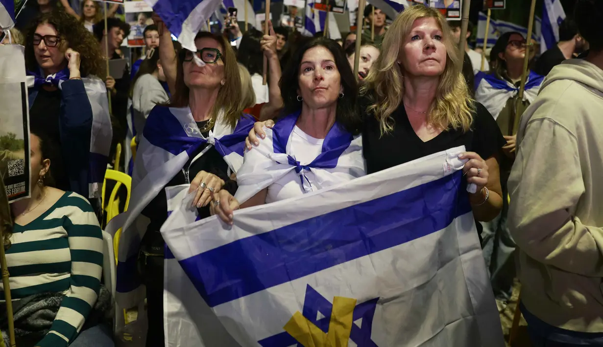 Kedua pihak bertikai, baik Hamas maupun Israel, sepakat tidak semua sandera yang telah tewas akan dikembalikan jenazahnya. Hal ini dikarenakan jasad para sandera sudah tidak bisa lagi ditemukan akibat bombardir Israel di Jalur Gaza. (Menahem KAHANA/AFP)