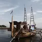 Kapal ekspedisi napak tilas "Spirit of Majapahit" di Dermaga Marina Ancol, Jakarta, (11/5). Kapal tersebut akan berlayar mengarungi lautan dengan rute Jakarta, Pontianak, Brunei Darussalam, Manila, Taiwan, Okinawa dan Tokyo. (Liputan6.com/Faizal Fanani)