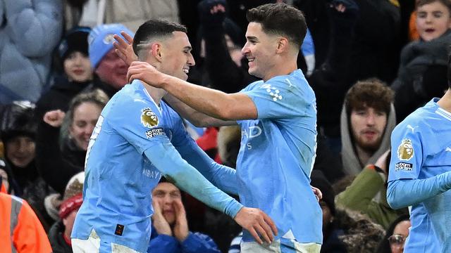 Dua pemain Manchester City, Phil Foden dan Julian Alvarez.
