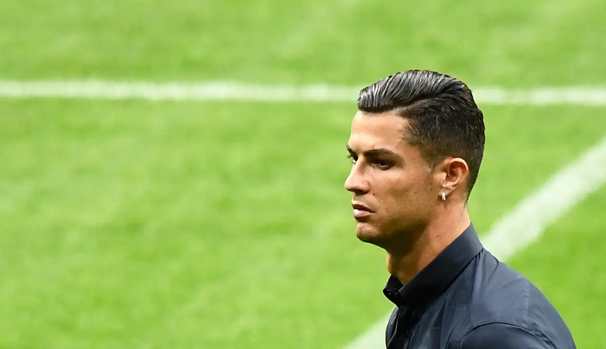 Penampilan pemain Juventus Cristiano Ronaldo saat mengunjungi Stadion Wanda Metropolitano, Madrid, Spanyol, Selasa (17/9/2019). Juventus akan menghadapi Atletico Madrid pada laga Grup D Liga Champions. (OSCAR DEL POZO/AFP)