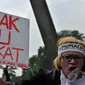 Para pengacara yang tergabung dalam Perhimpunan Advokat Indonesia (Peradi) melakukan aksi, Jakarta (11/9/2014) (Liputan6.com/Johan Tallo)
