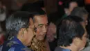 Jokowi dan Wapres Boediono terlihat berbincang hangat saat menghadiri acara Hut DPD yang ke-10, di Gedung Nusantara IV DPR RI, Senayan, Jakarta, Senin (29/9/2014) (Liputan6.com/Herman Zakharia)